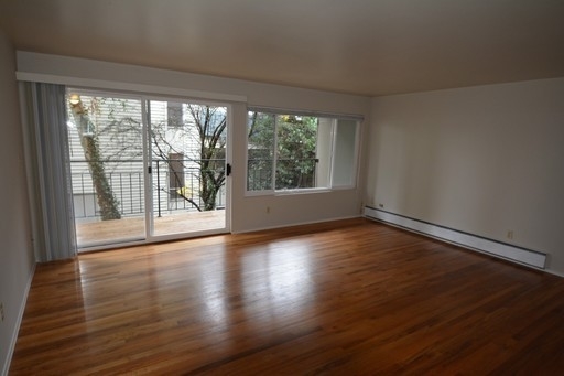 Great Queen Anne Location, Huge Deck, New Wood Floors, Remodeled Kitchen  Bath